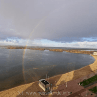 regenboog foto strand Nesselande